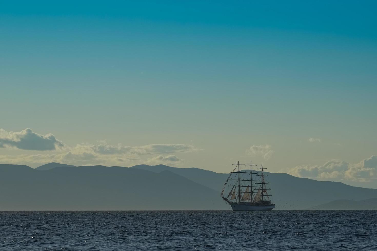 Vintage white sailboat on the background of the seascape. photo