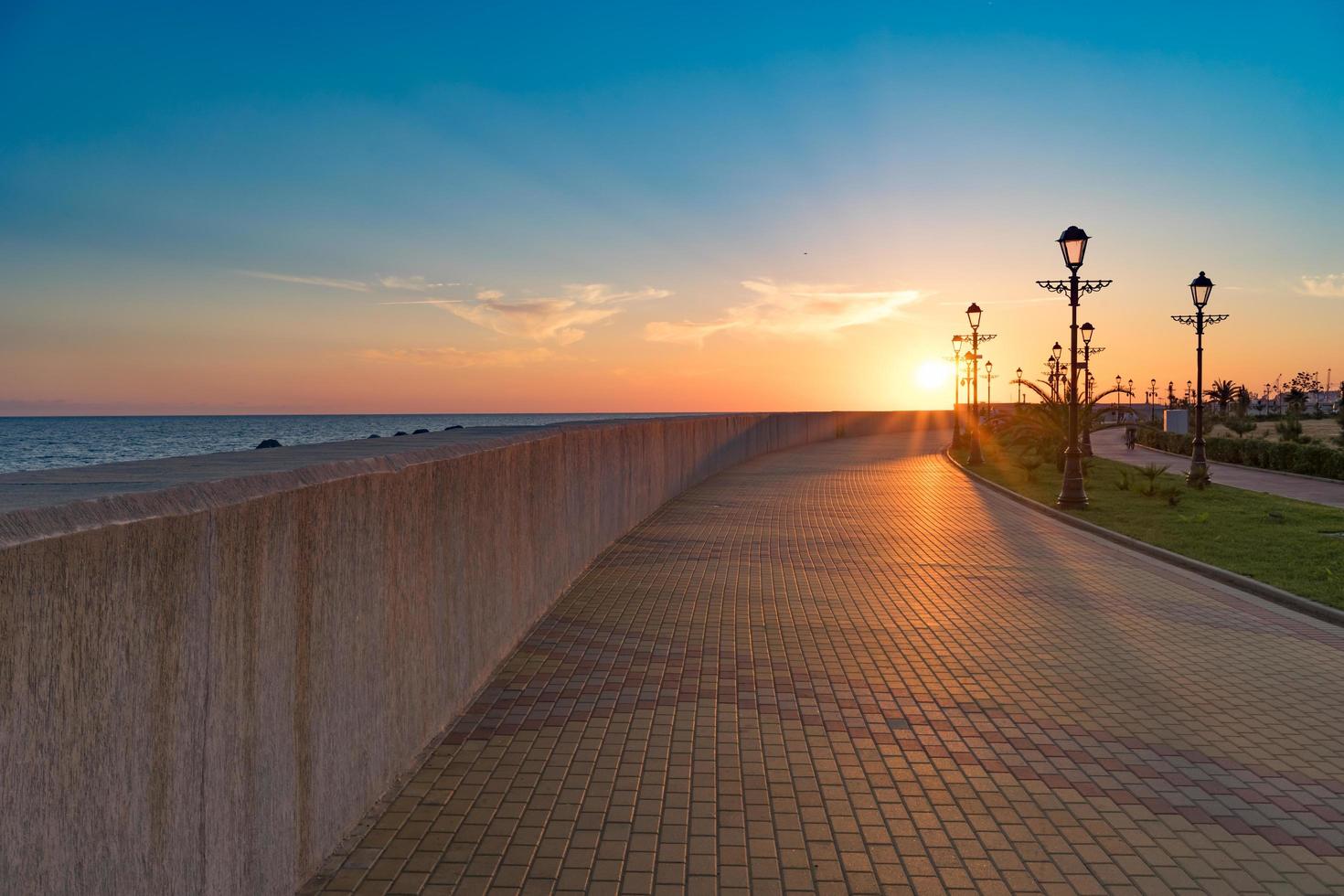 Sochi embankment during sunset in summer without people. photo