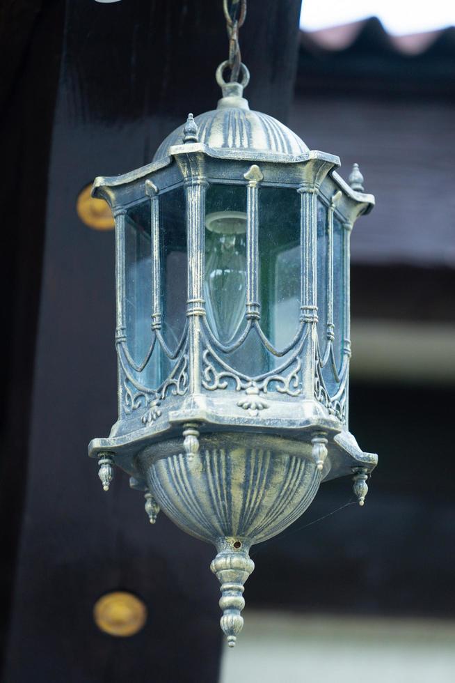 Vintage lamp on a dark background photo