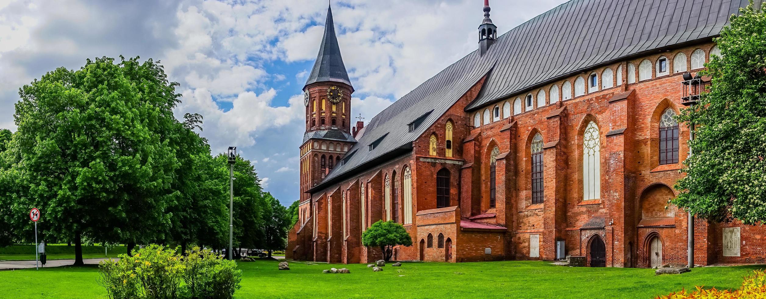 Panorama with a view of the famous Cathedral surrounded by lush summer greenery. photo