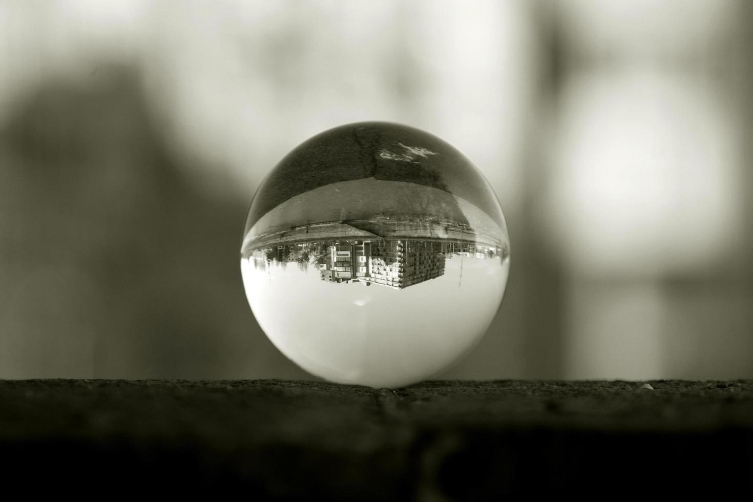 Landscape seen through the lens ball. photo