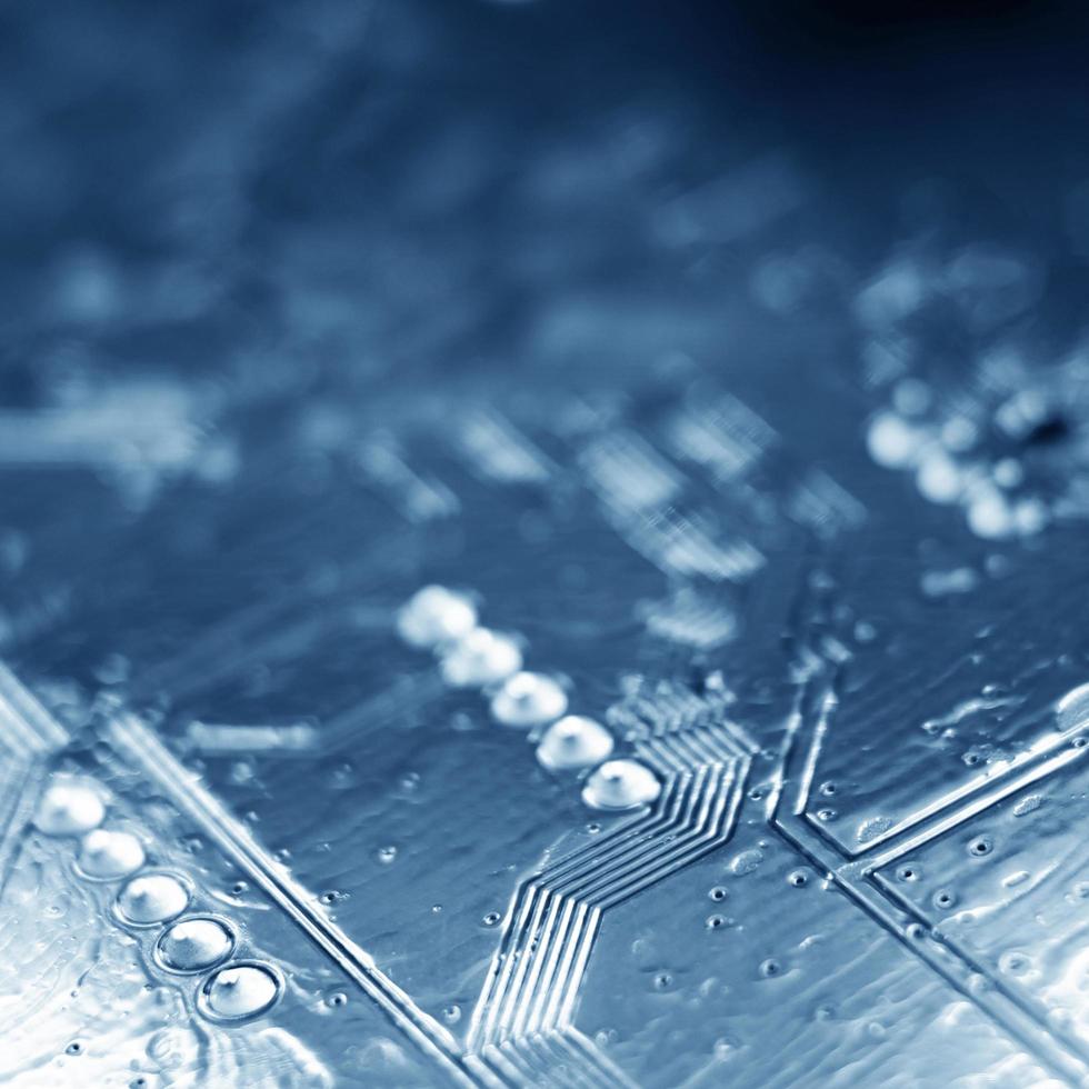 Close up image of a circuit board in blur. photo