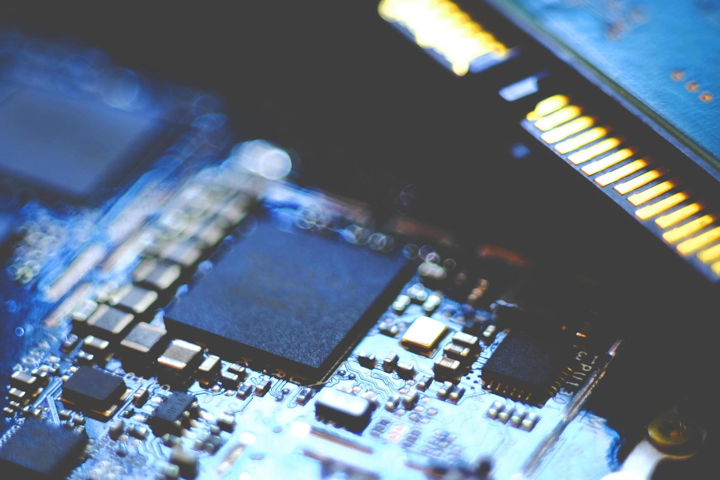 Close up image of a circuit board in blur. photo