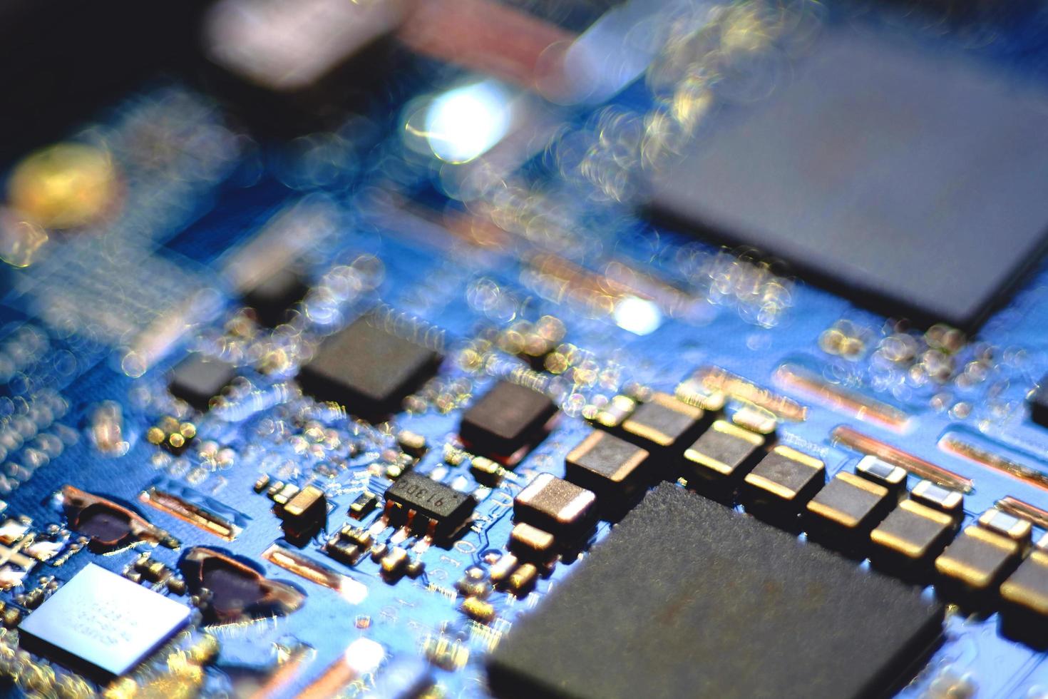 Close up image of a circuit board in blur. photo