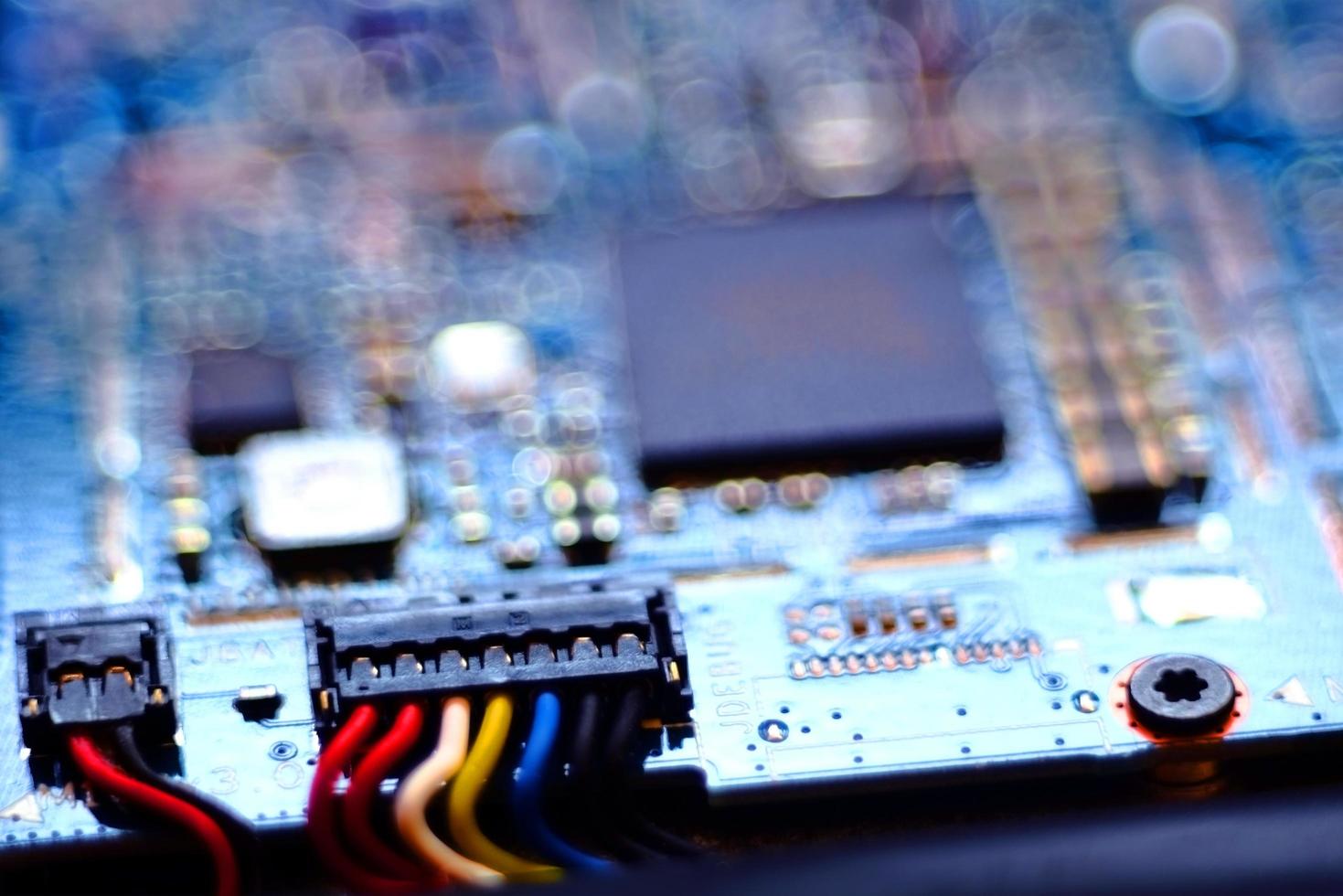 Close up image of a circuit board in blur. photo