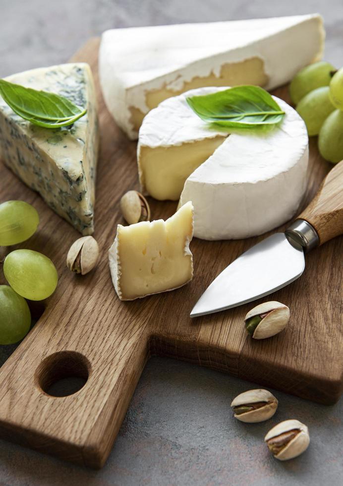 Various types of cheese and snacks photo