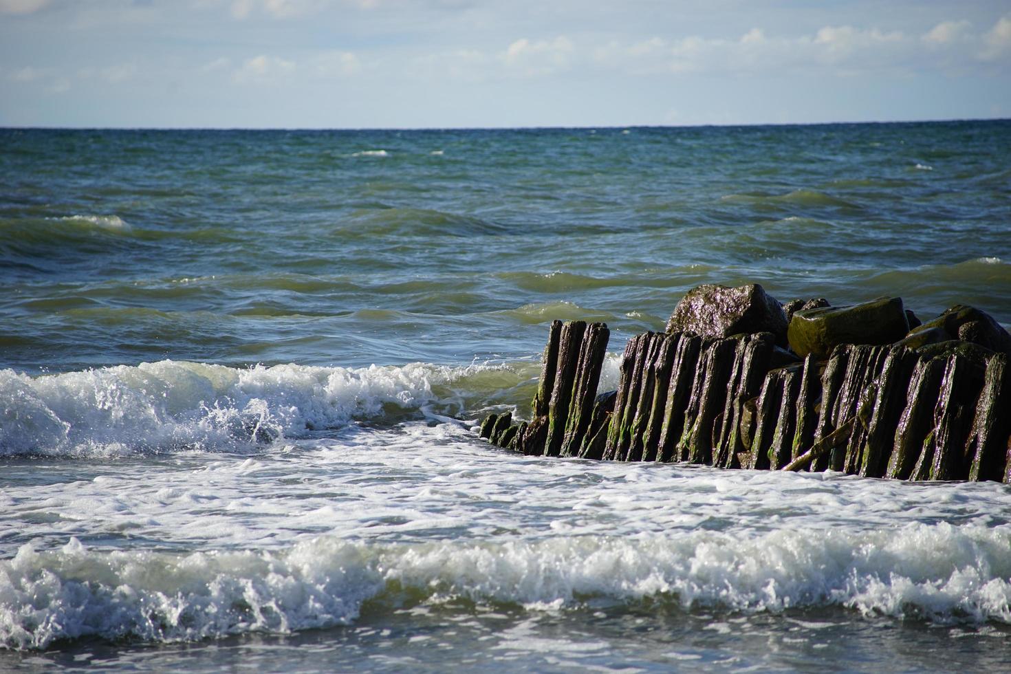 Seascape with breakwaters. photo