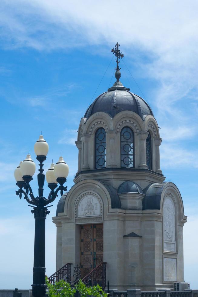 Chapel on the waterfront of the city. photo