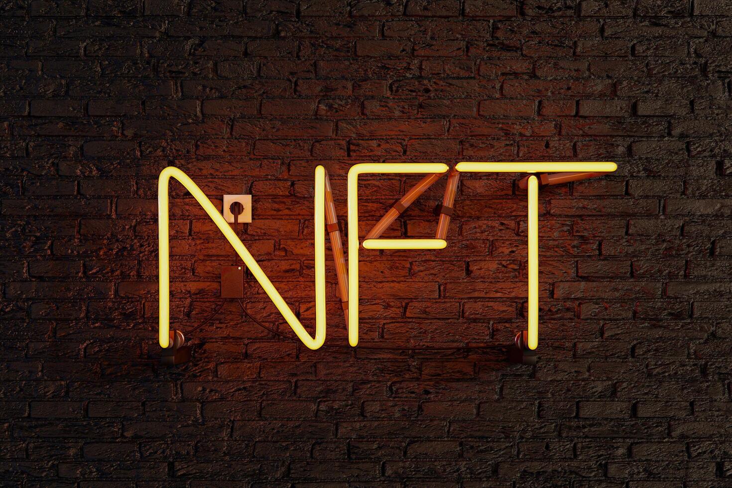 Yellow neon lamp with illuminated NFT sign photo