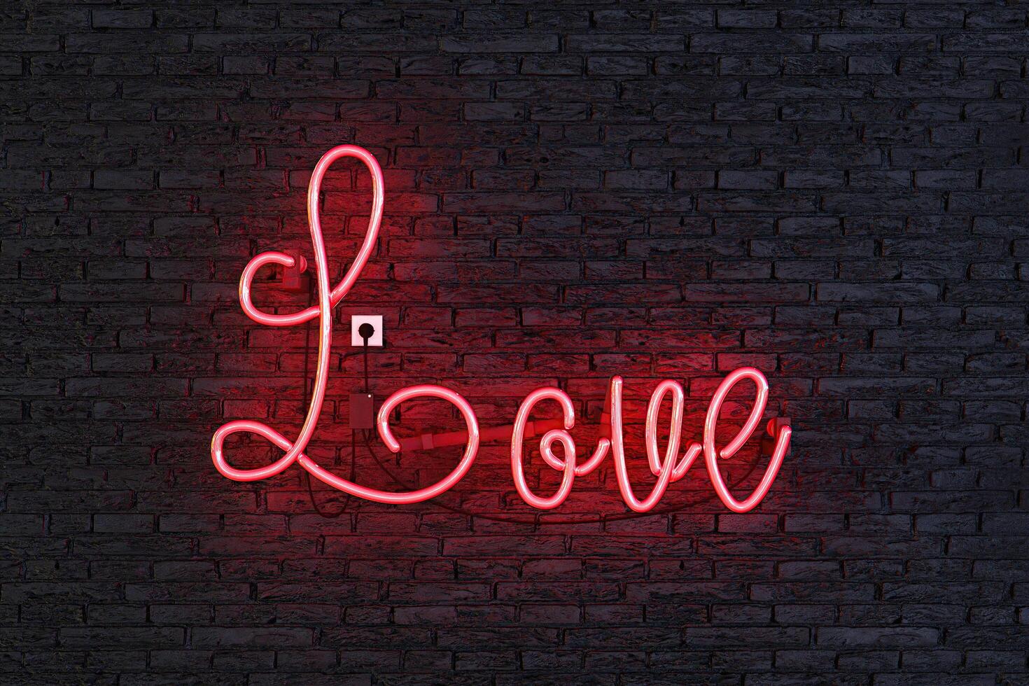 Red neon lamp with the word LOVE on dark brick wall photo