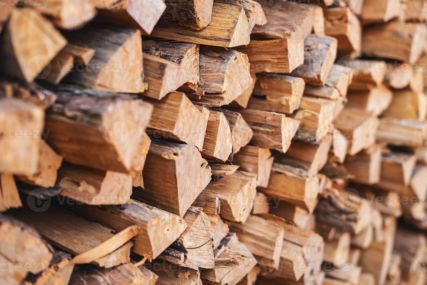 Stacked firewood background photo