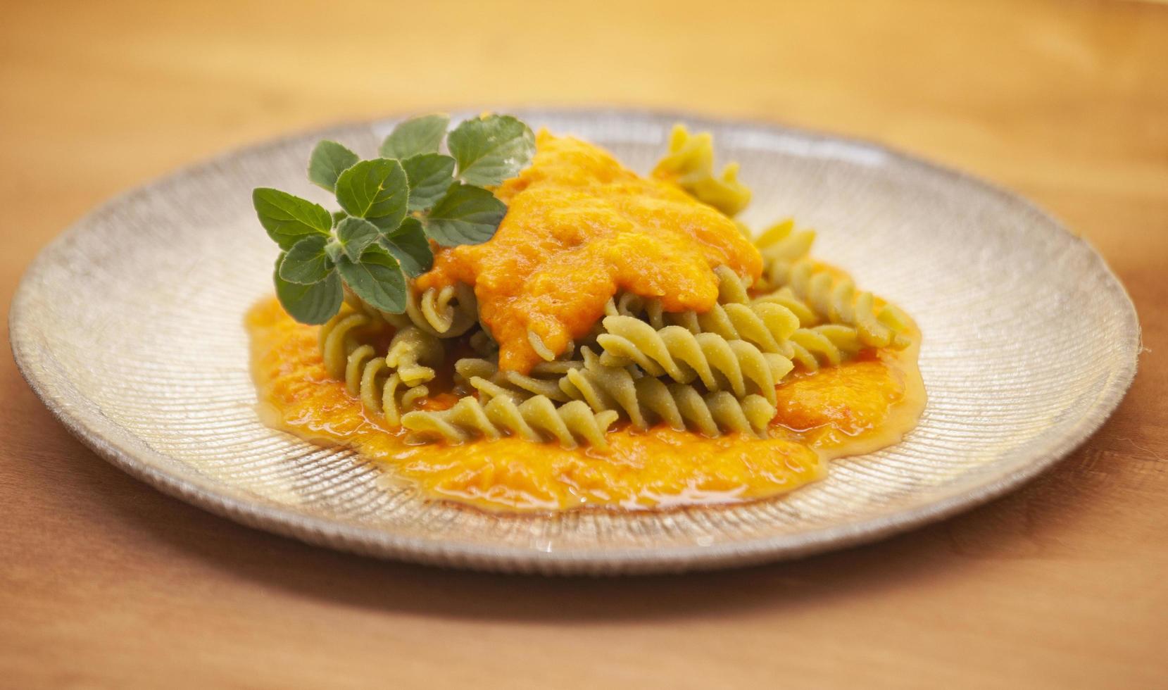 Fusilli with pea flour in pepper sauce photo