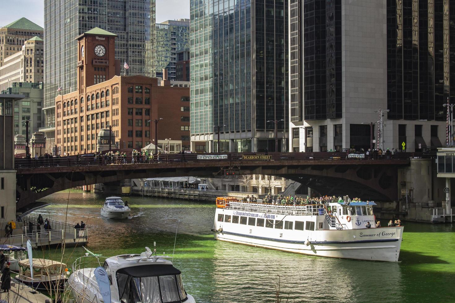 Chicago, Illinois, Mar 17, 2017 - Boats on the Chicago Riverwalk during St Patrick's Day photo