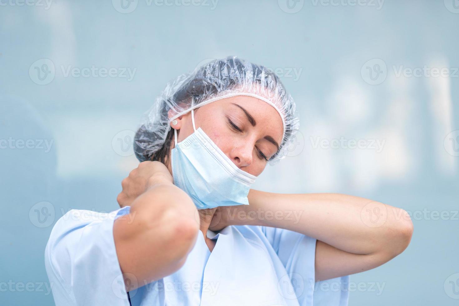 Overwhelmed nurse during her work shift photo