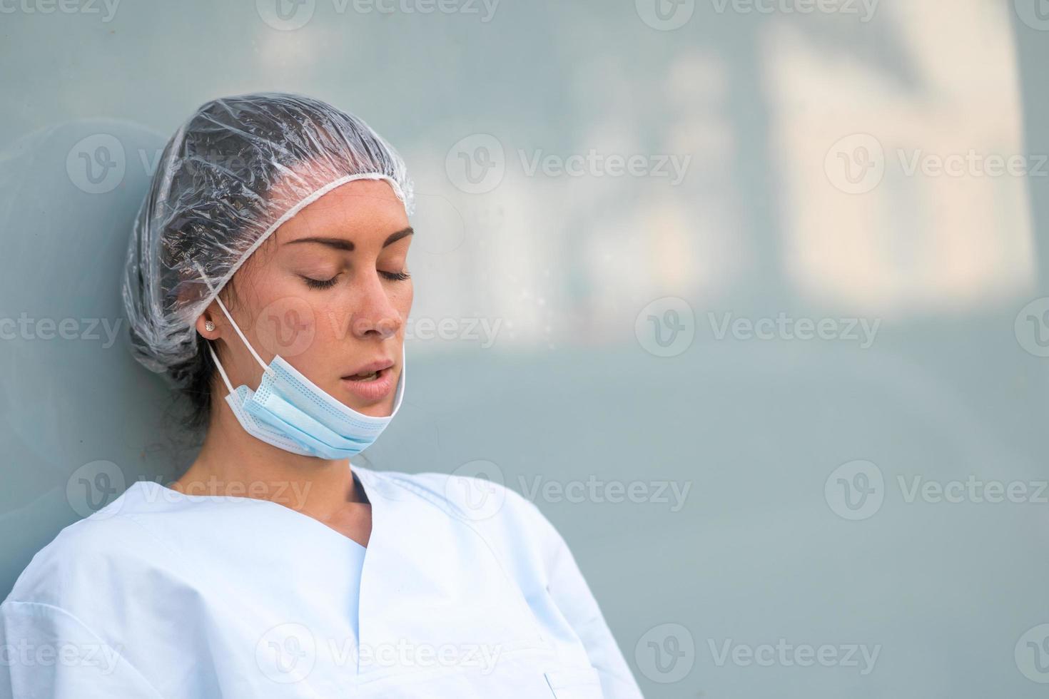 Concerned doctor resting photo