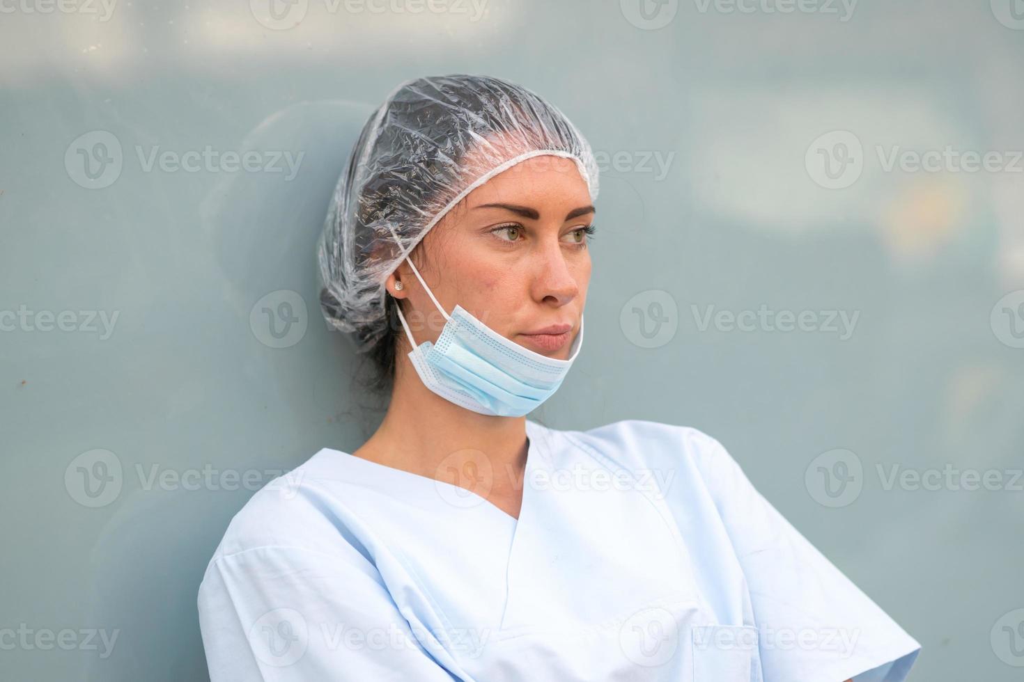 Concerned doctor resting photo