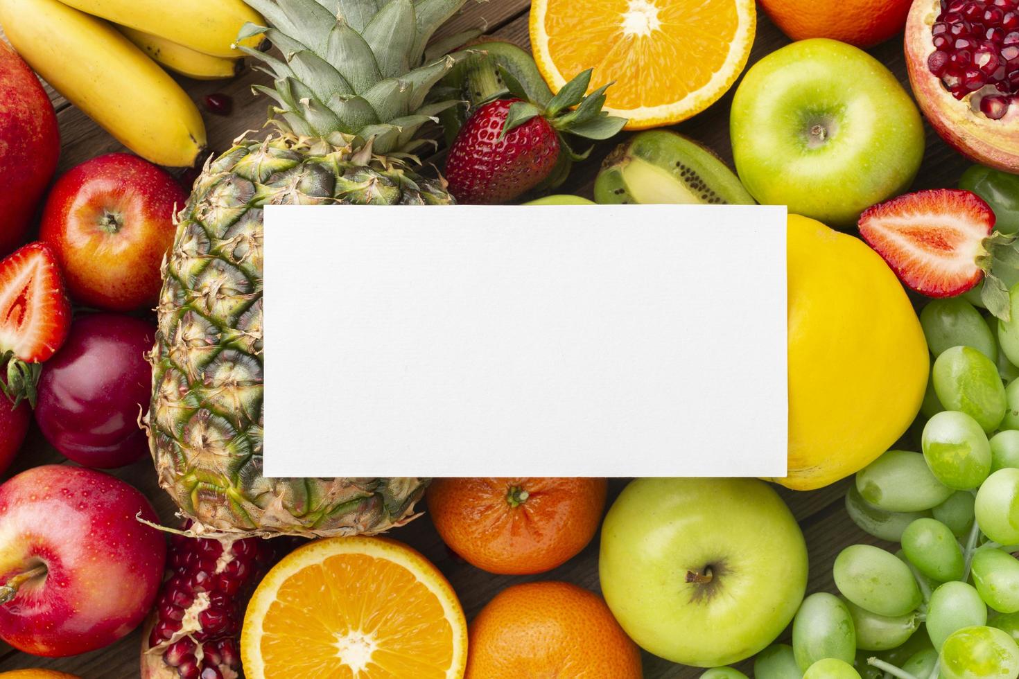 Blank card on top of fruit photo