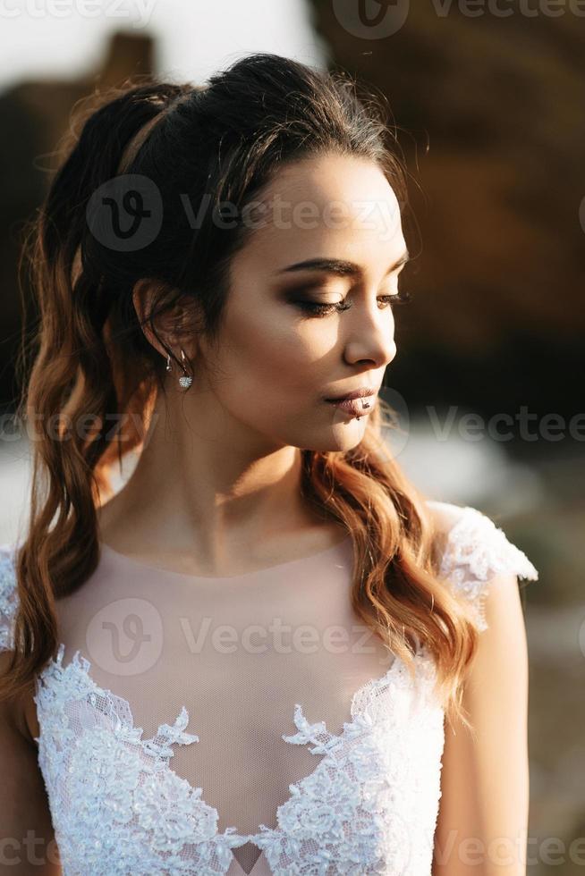 bride on the shore of the black sea photo