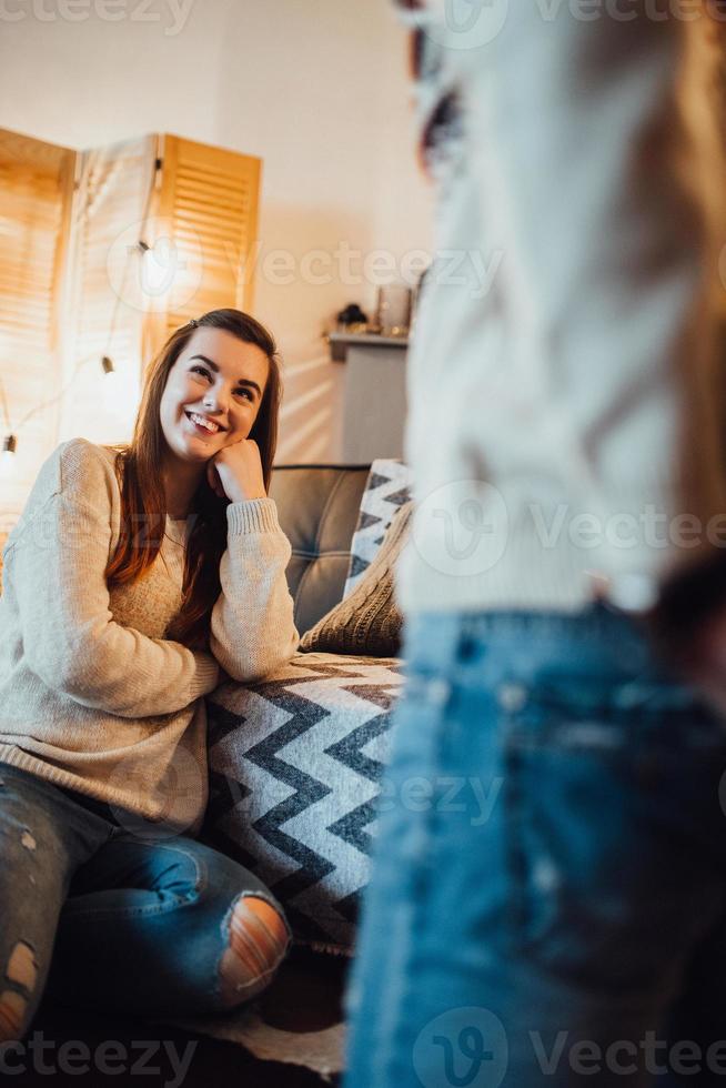 guy and a girl celebrate the new year together and give each other gifts photo