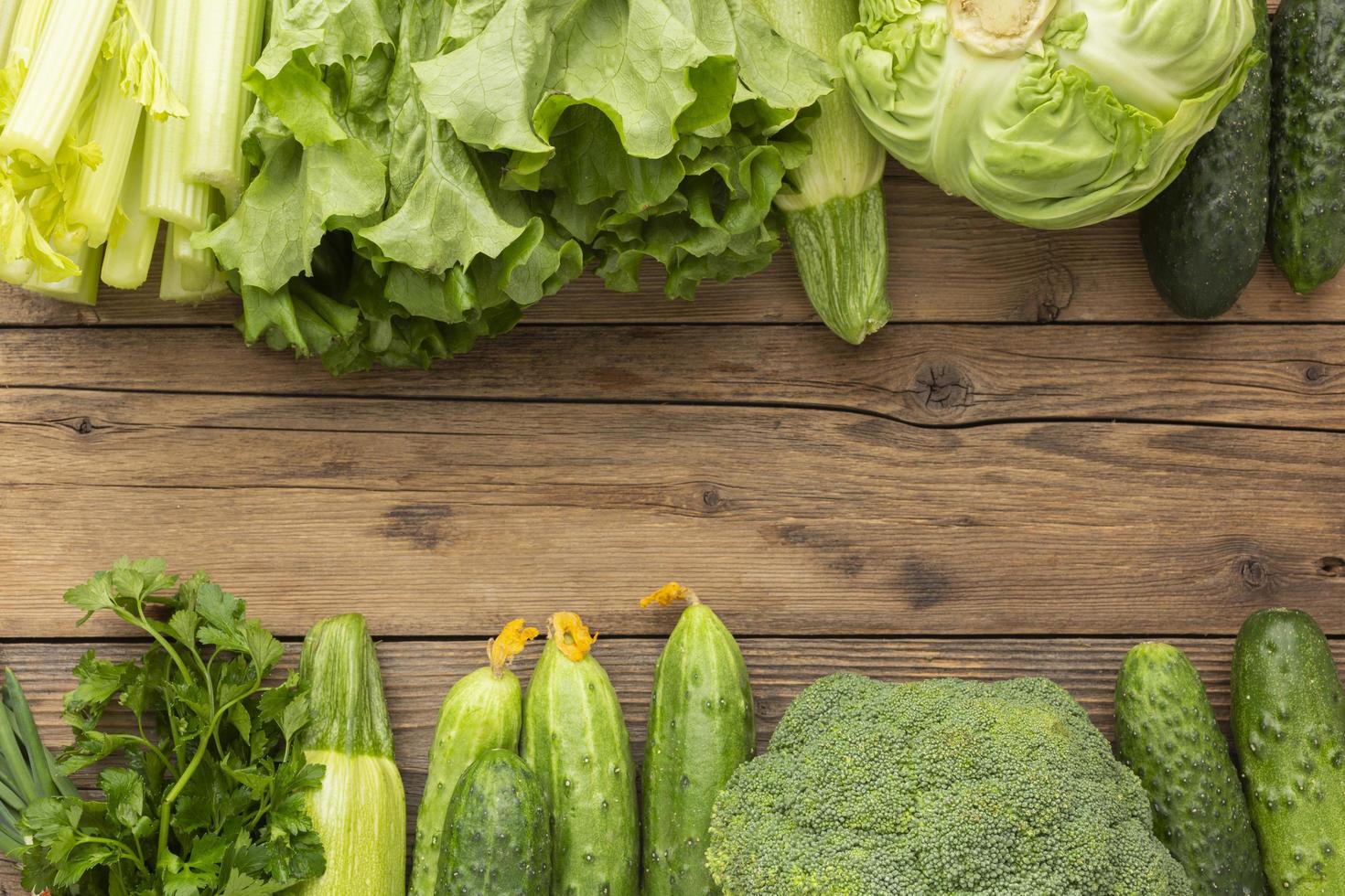 Top view of vegetables on wooden table photo