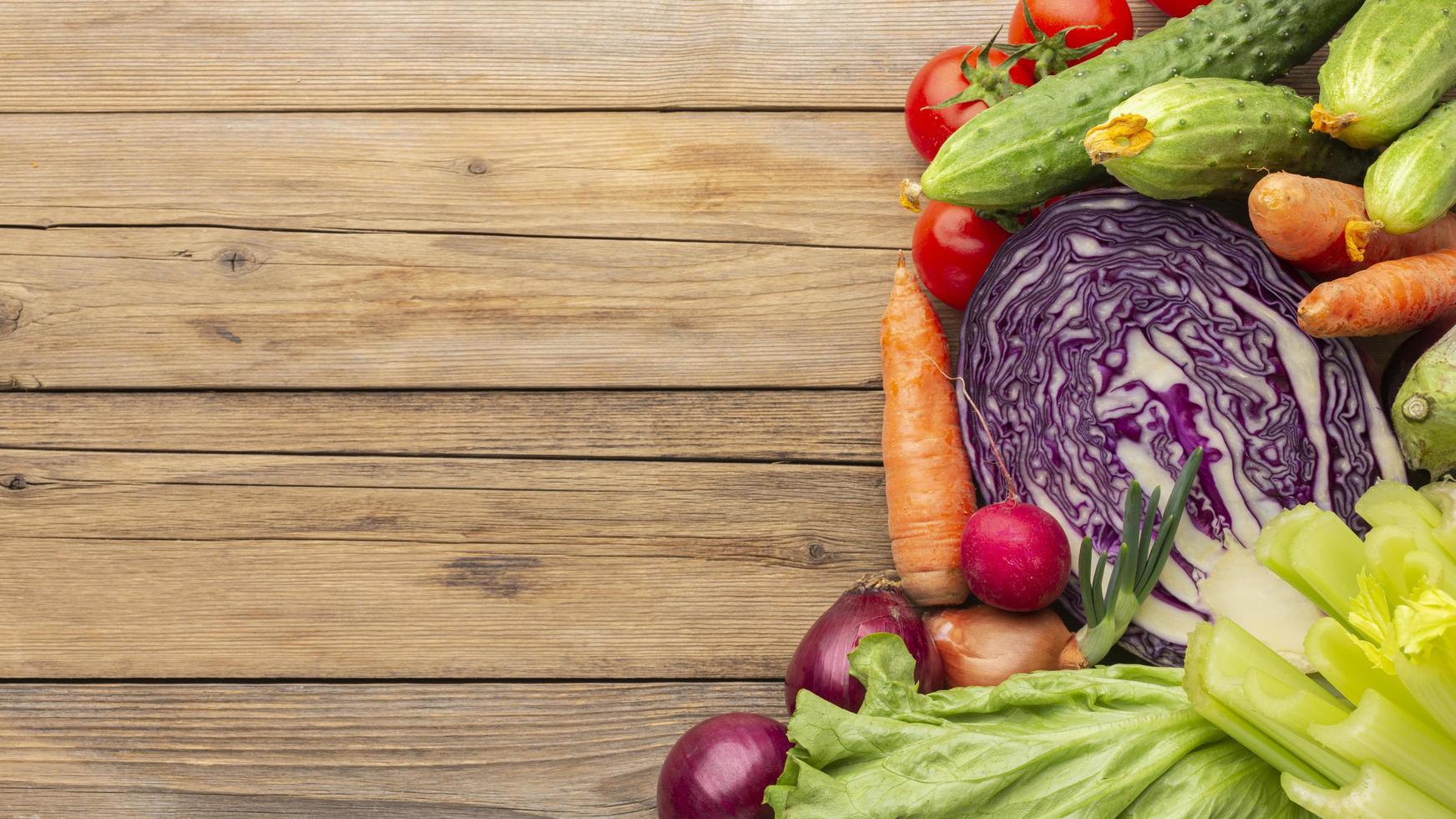 Vegetables on wooden table flat lay photo