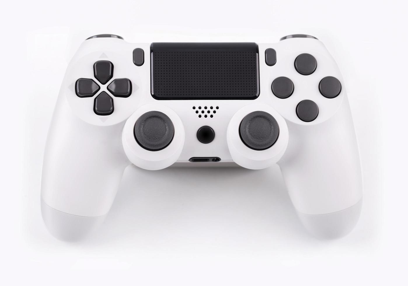 Joystick gaming controller isolated on white background , Video game console developed Interactive Entertainment photo