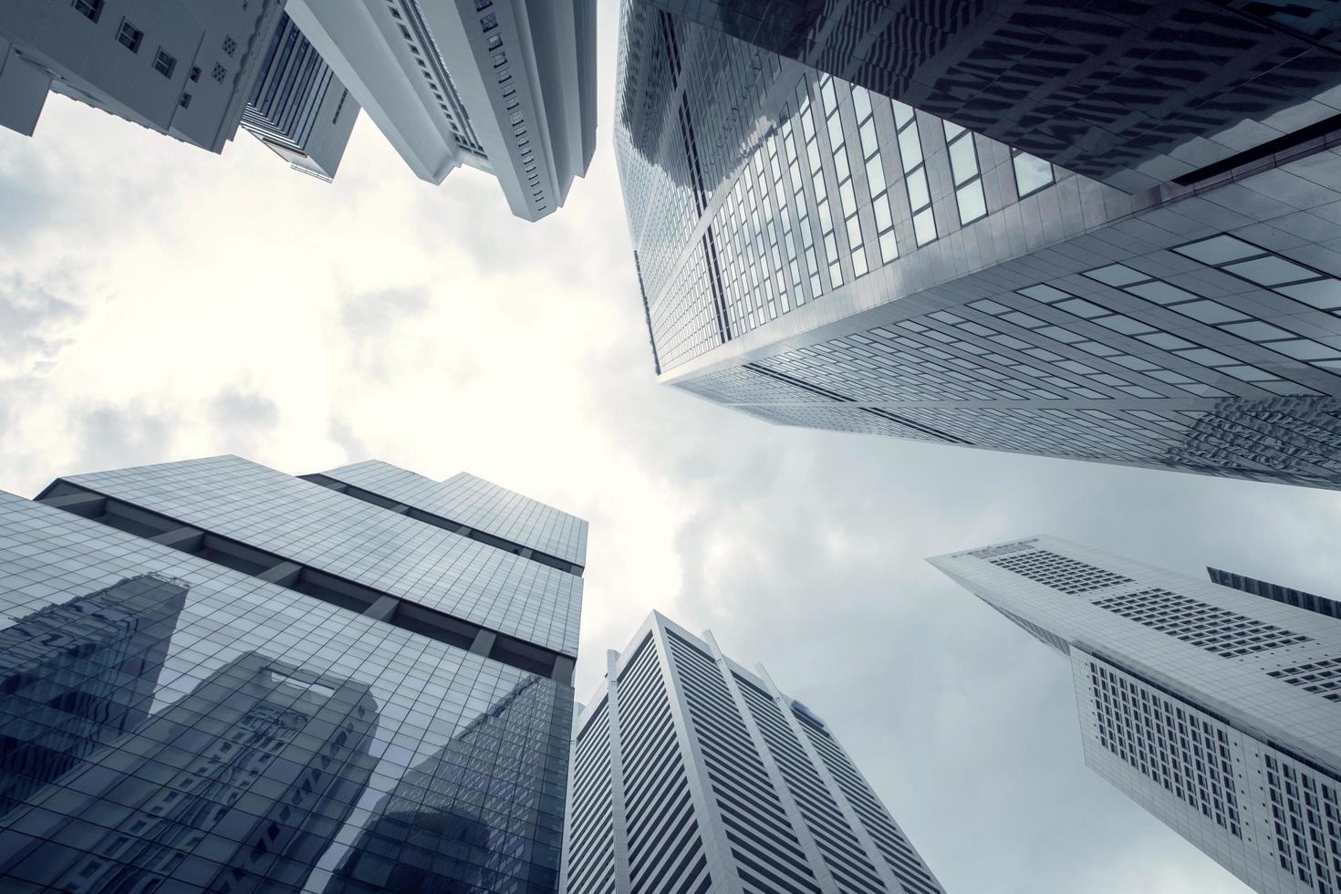 View of modern business skyscrapers glass and sky view landscape of commercial building in central city photo