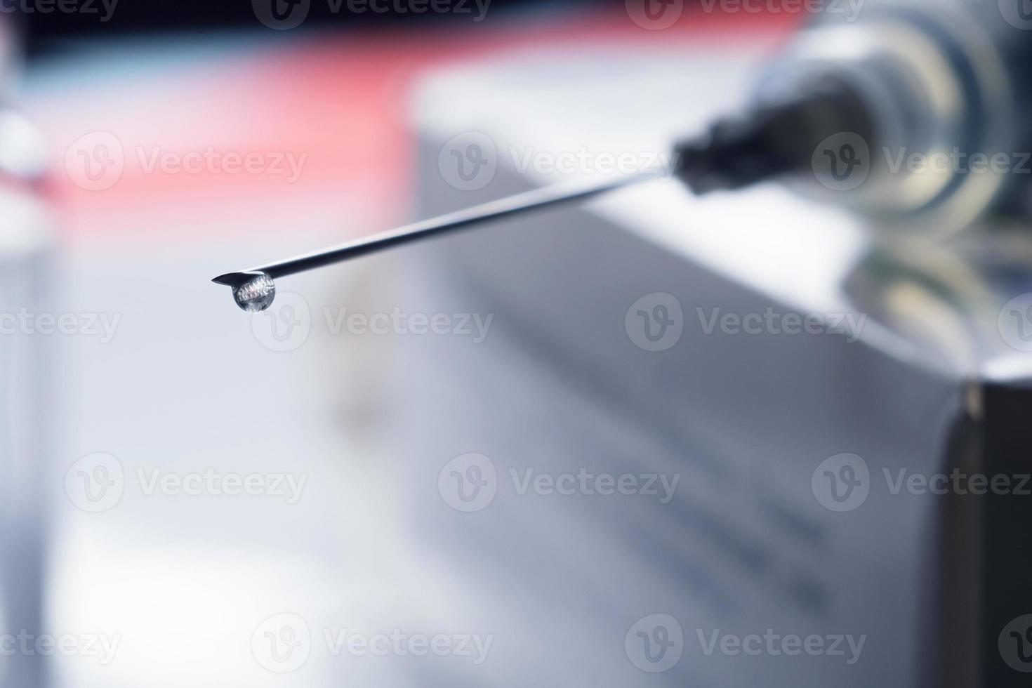 Close up image of a syringe photo