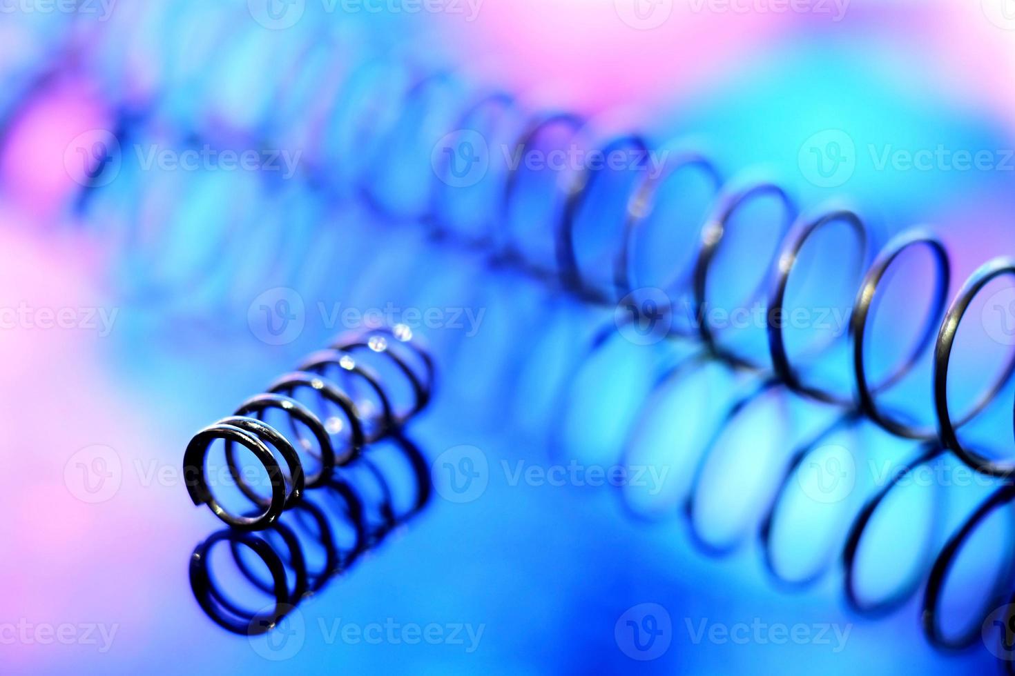 Close up view of metal springs in blught vivid colors photo