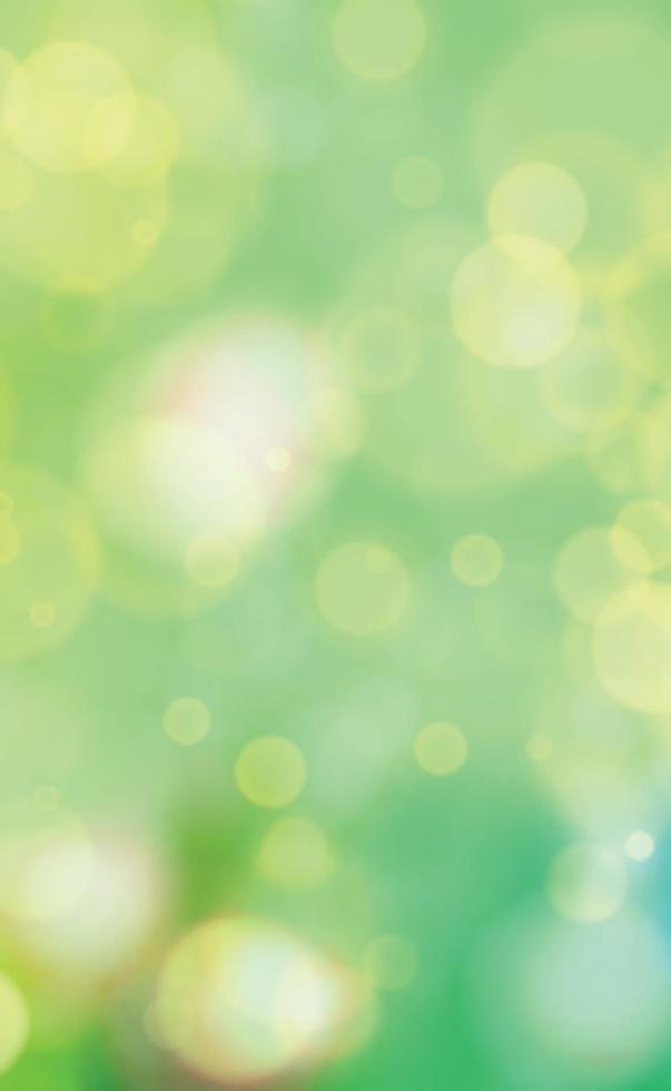 Multicolored blurry bokeh on a yellow background vector