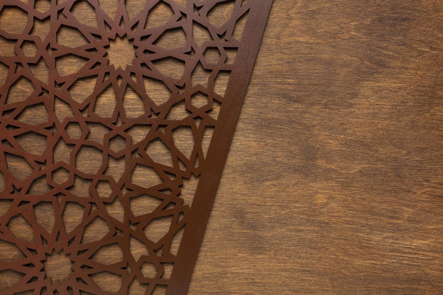 Brown geometric pattern on wood photo