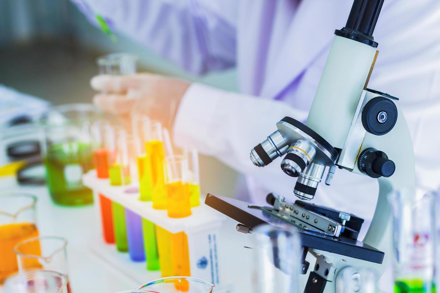 Close-up, medical laboratory, scientists use a microscope for testing liquid biology. Technology photo