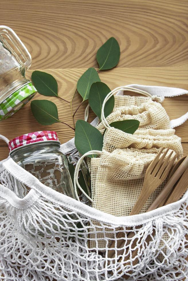 Mesh bag cotton bags and glass jars photo