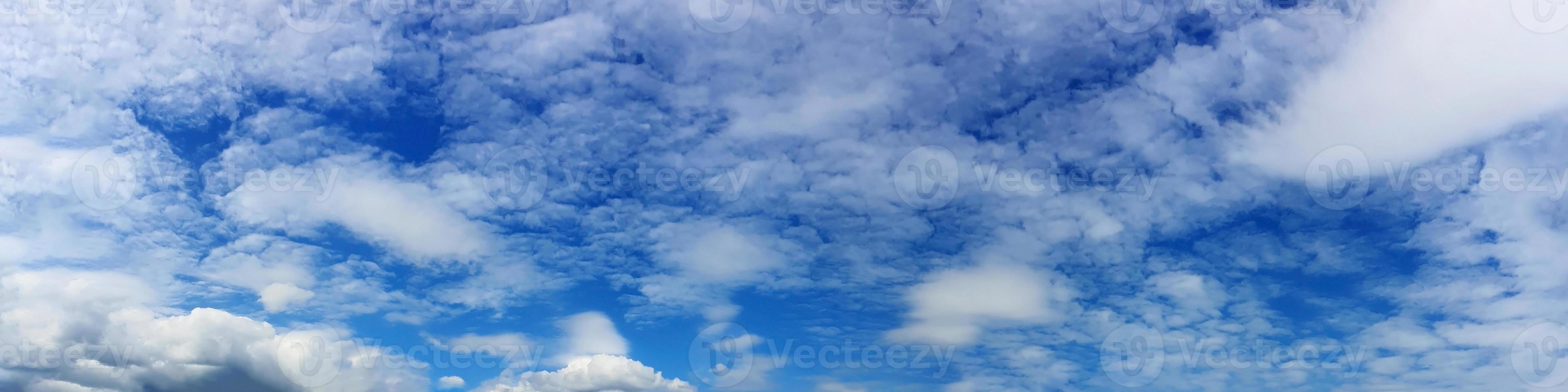 Panorama sky with beautiful cloud on a sunny day photo