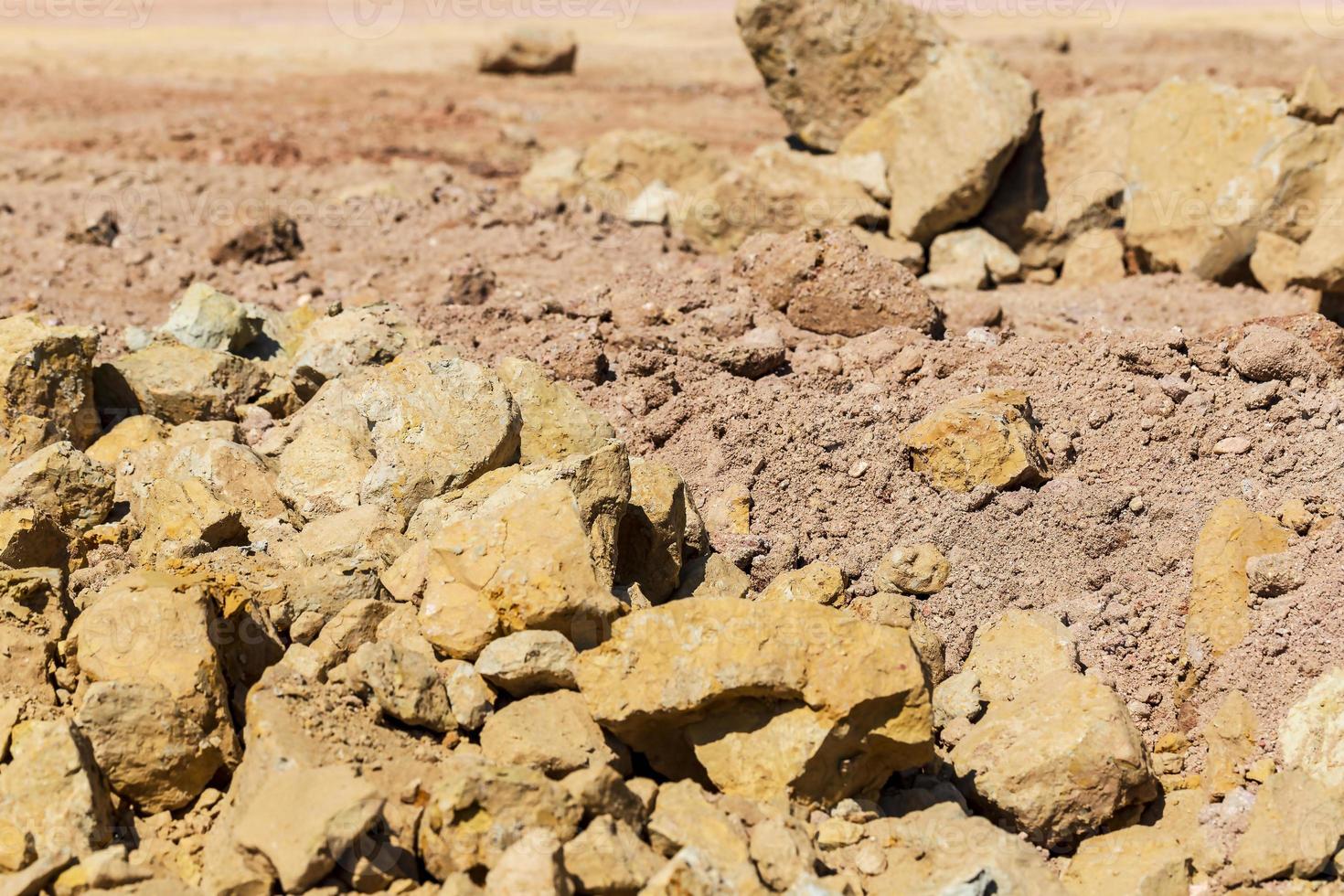 Mounds of soil and stones that were filled in the construction area. photo