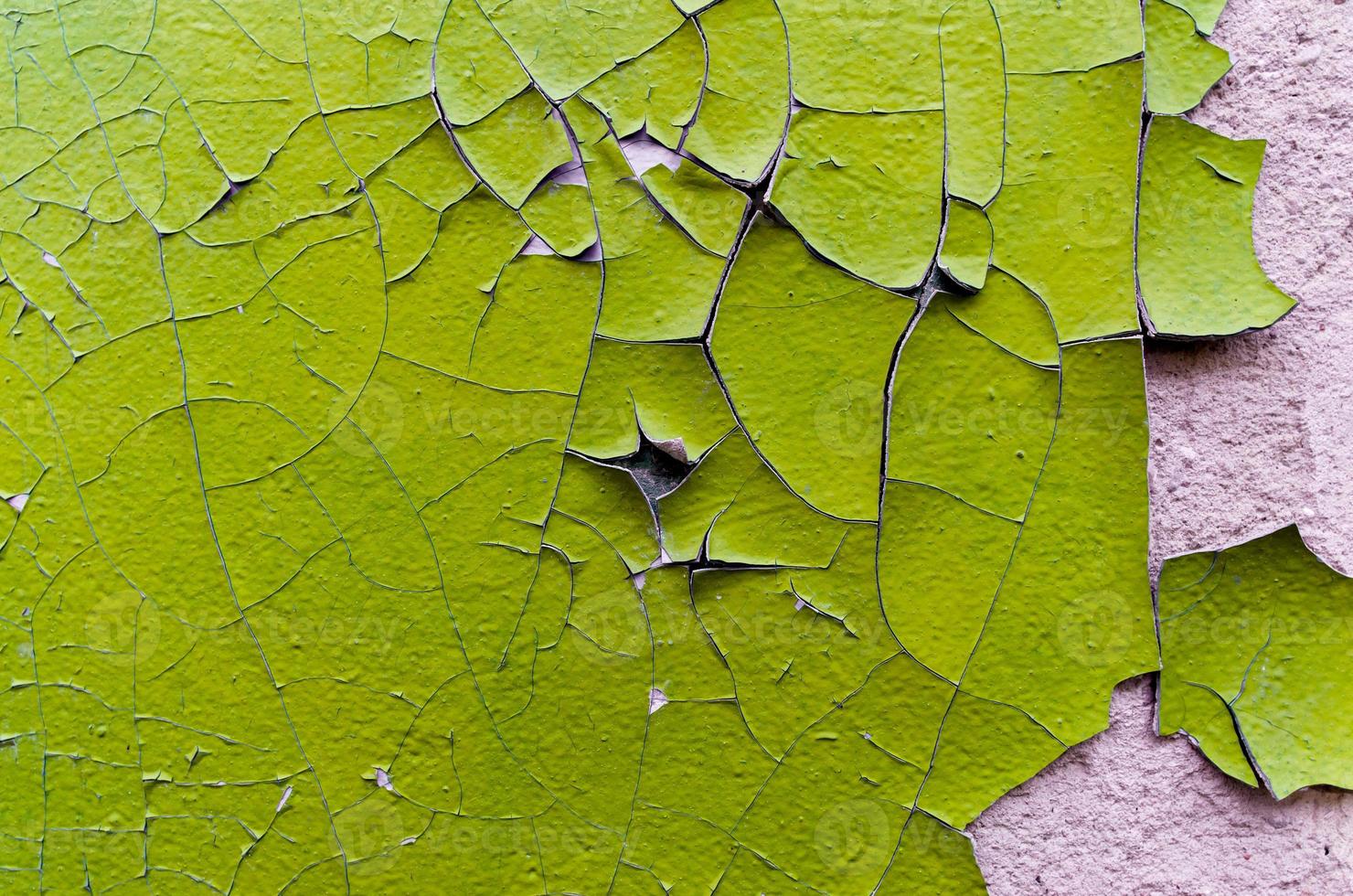 Viejo muro con pintura amarilla, cerrar foto