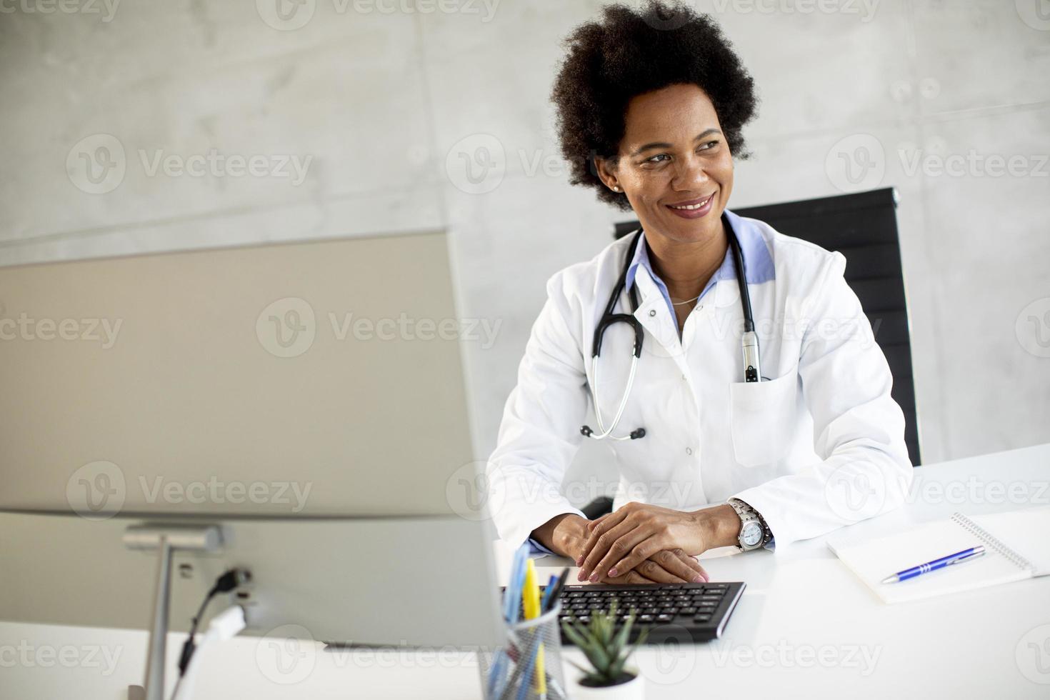 Close-up of a doctor at a desk photo