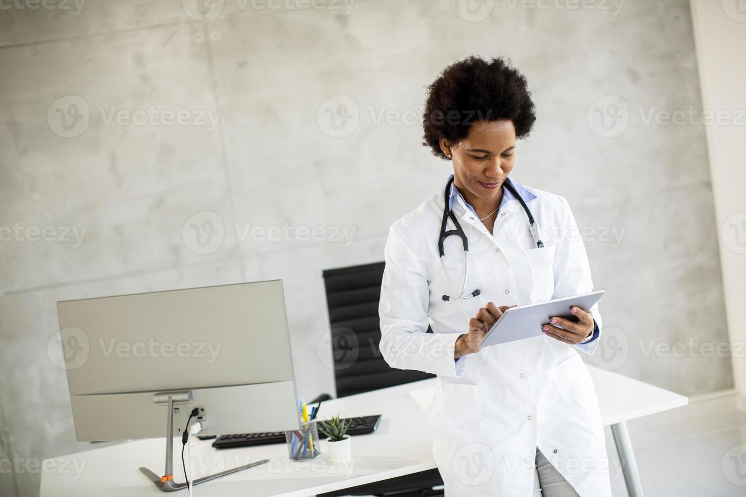 Doctor checking paperwork photo