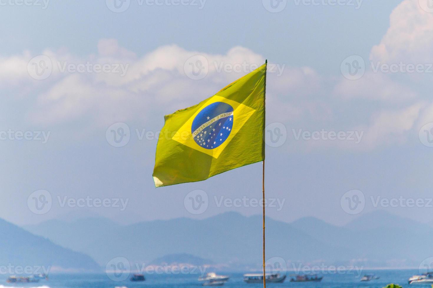 Brazil flag outdoors on a beach in Rio de Janeiro photo