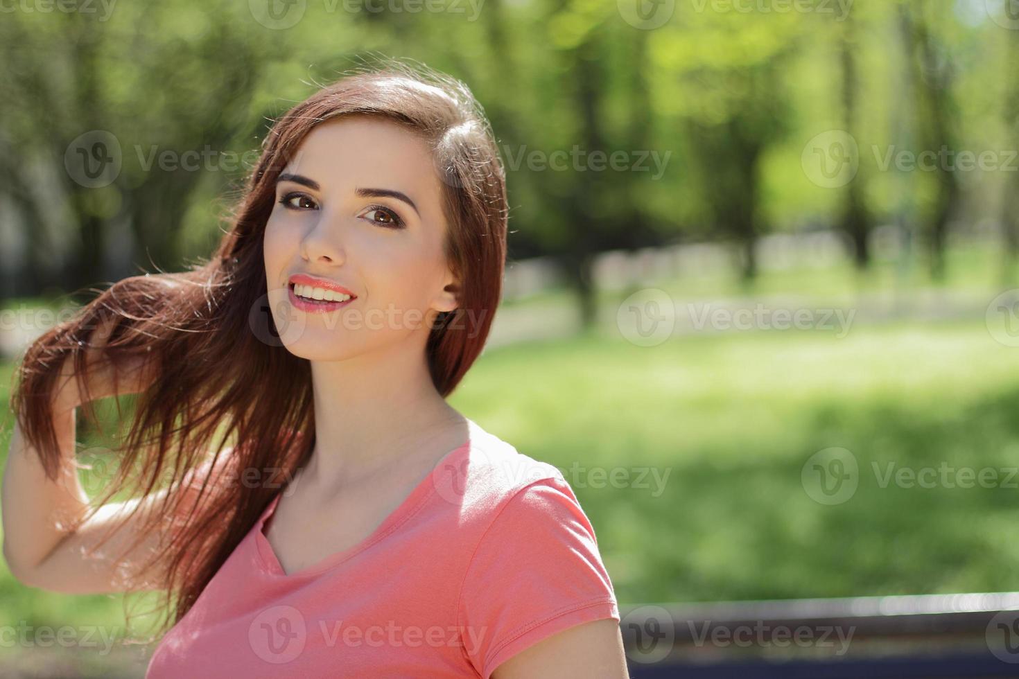 Close-up of a woman in a park photo