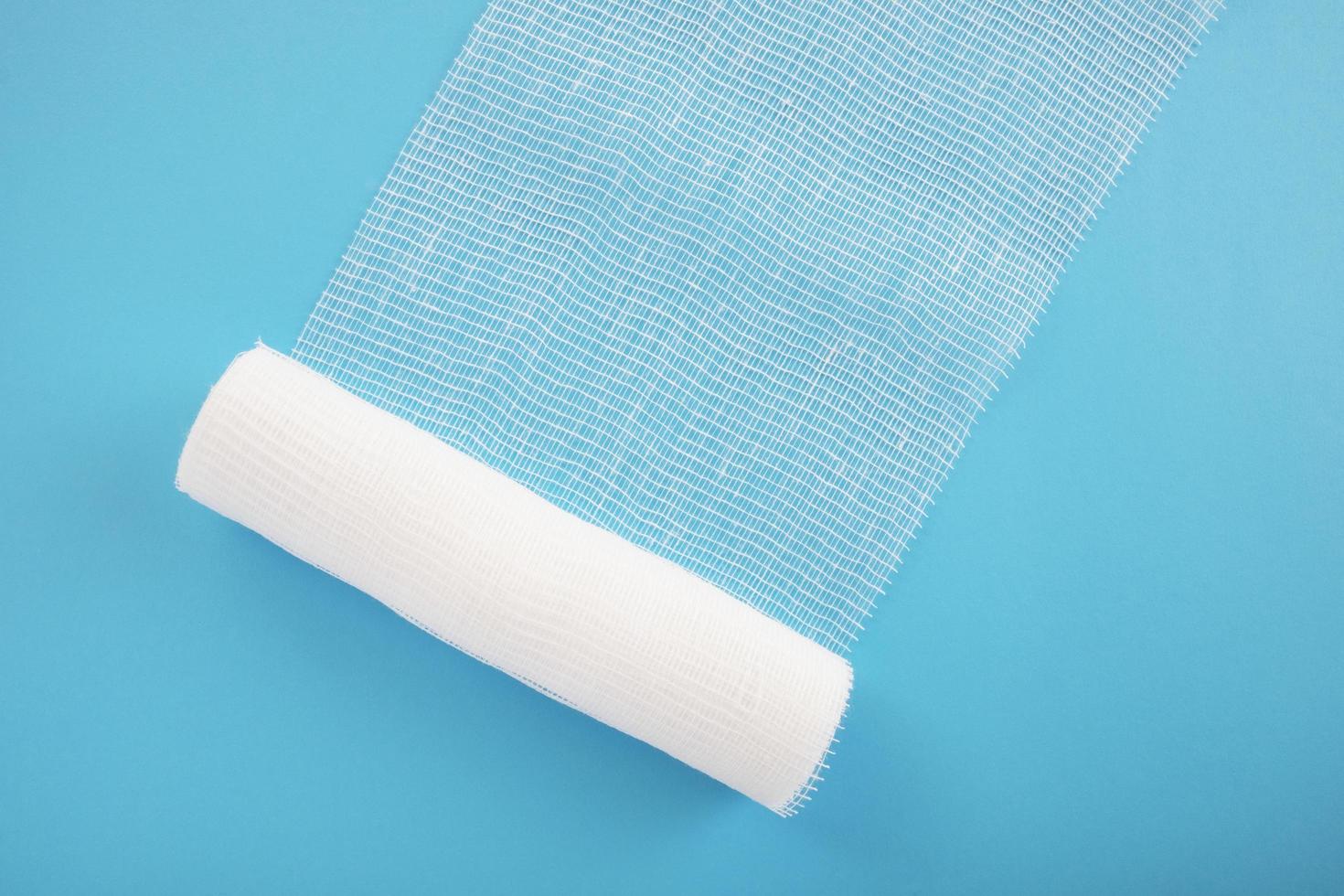 White sterile bandage on bright color background photo