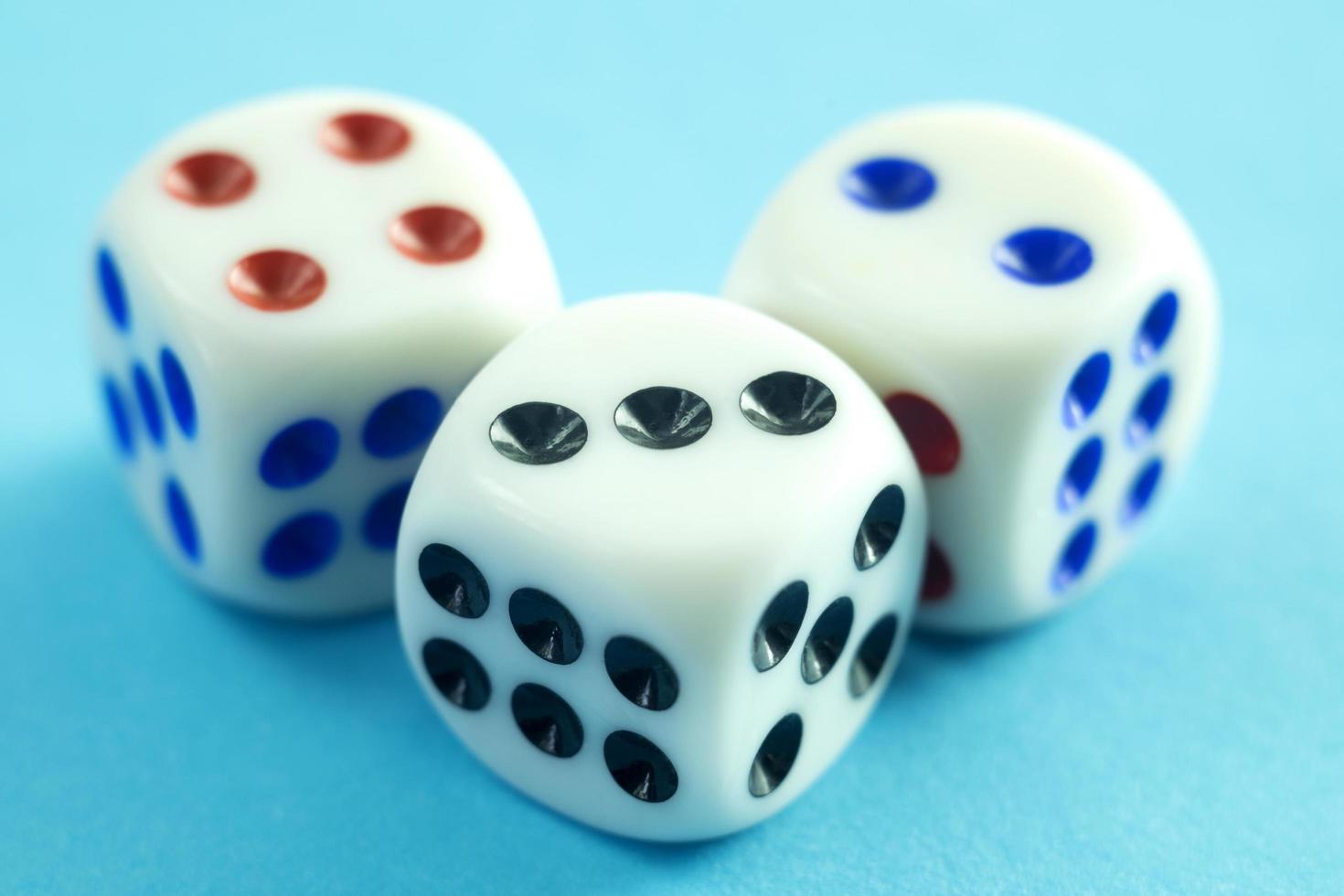 Dice on blue background photo