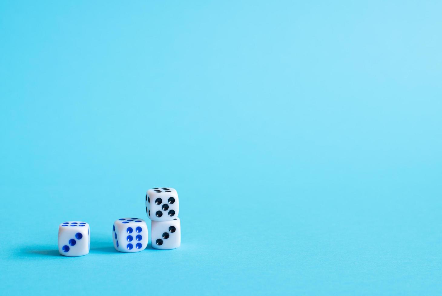 Dice on blue background photo