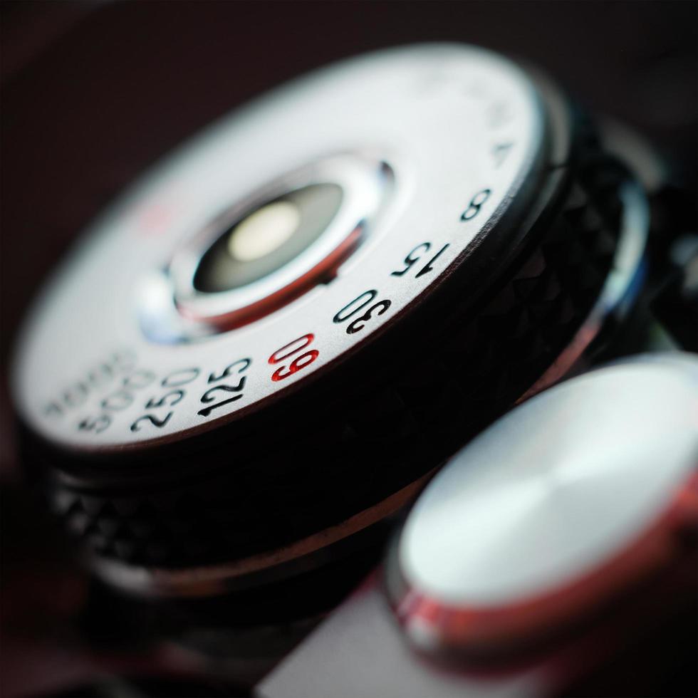 Close up image of a film camera shutter dial photo