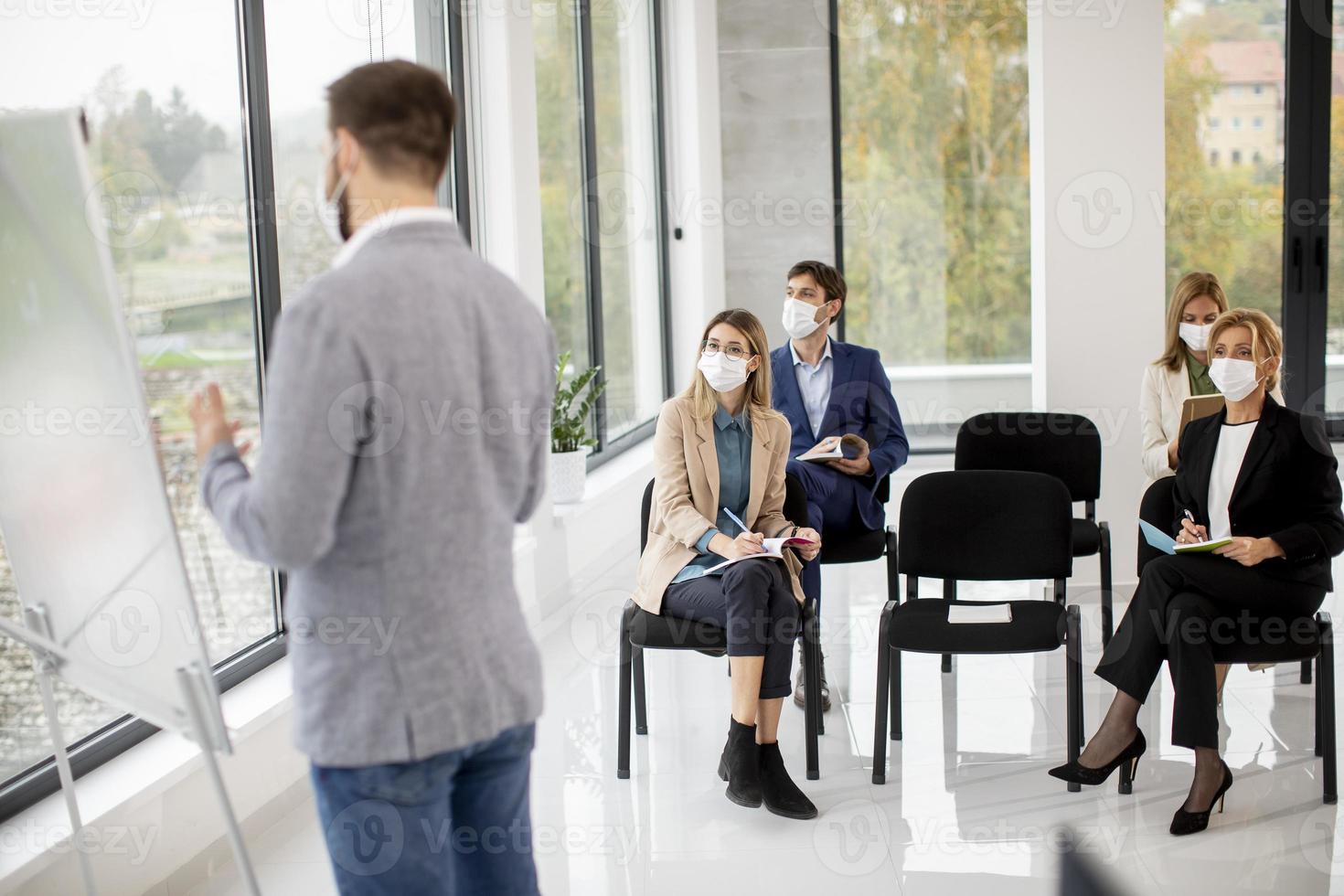 Indoor meeting with masks on photo