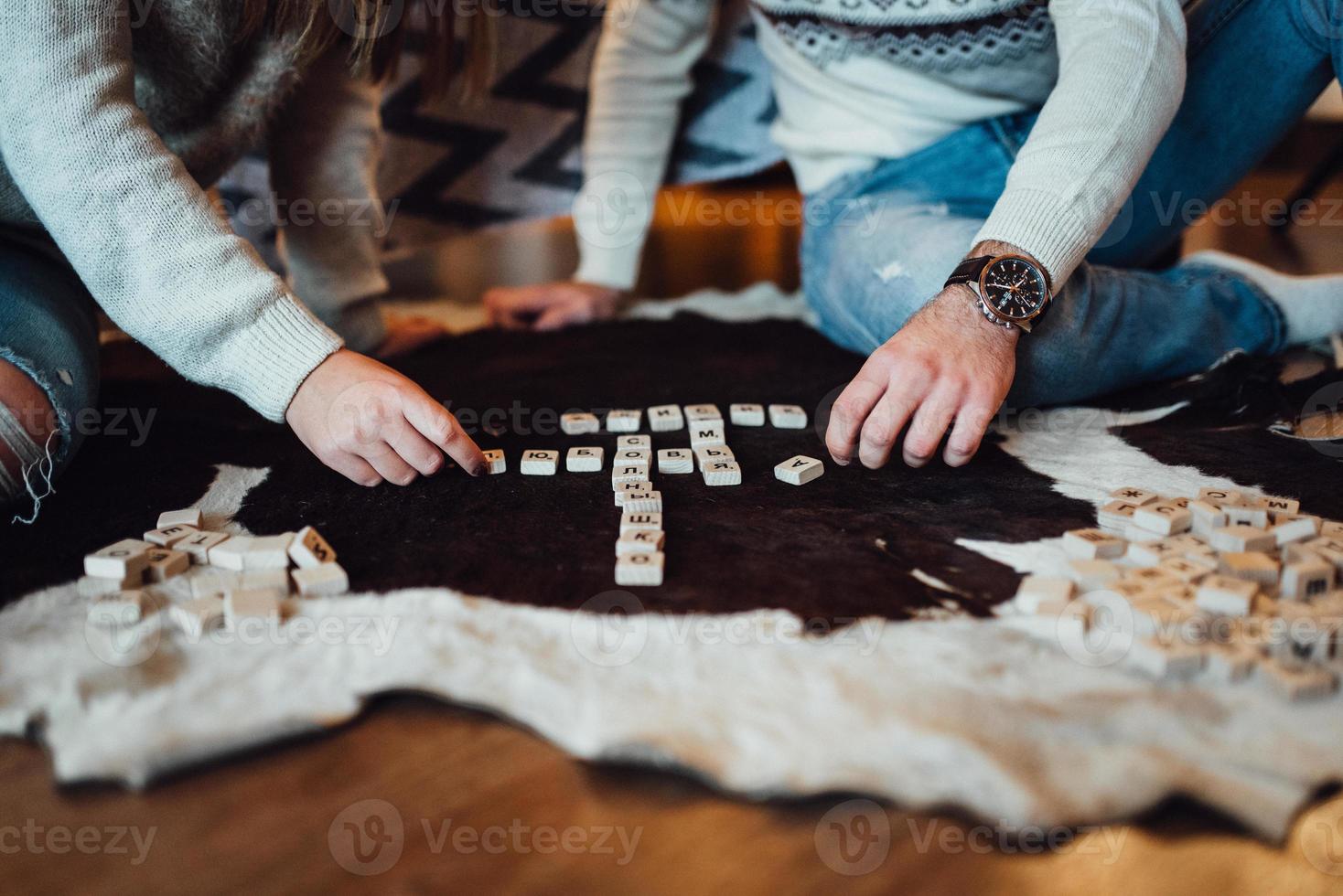 Guy and a girl celebrate the new year together and give each other gifts photo