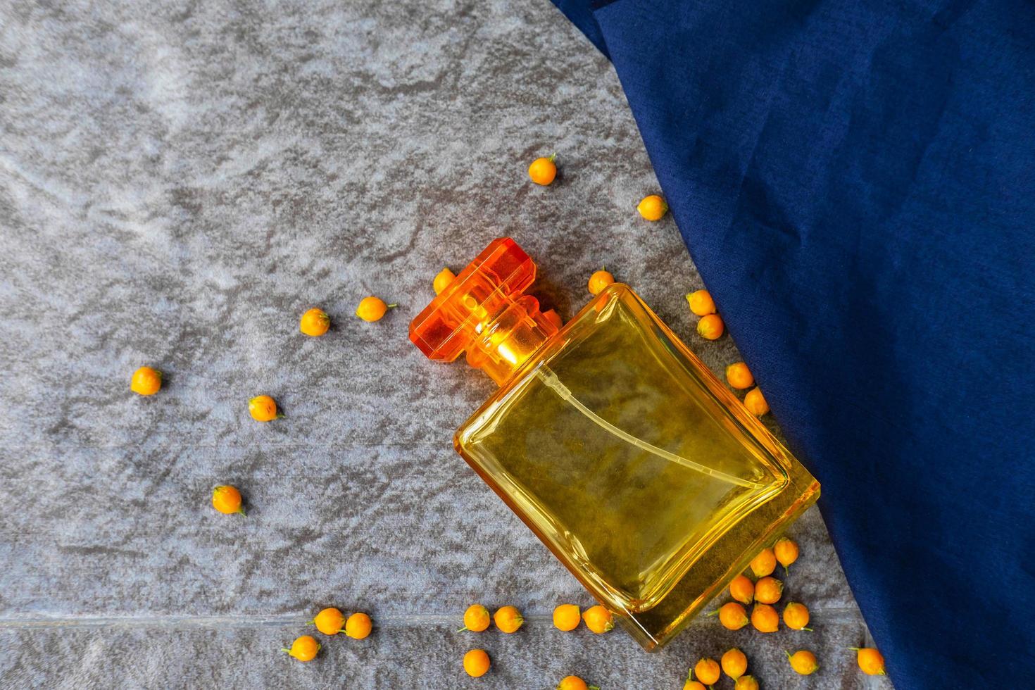 Golden perfume and perfume bottle photo