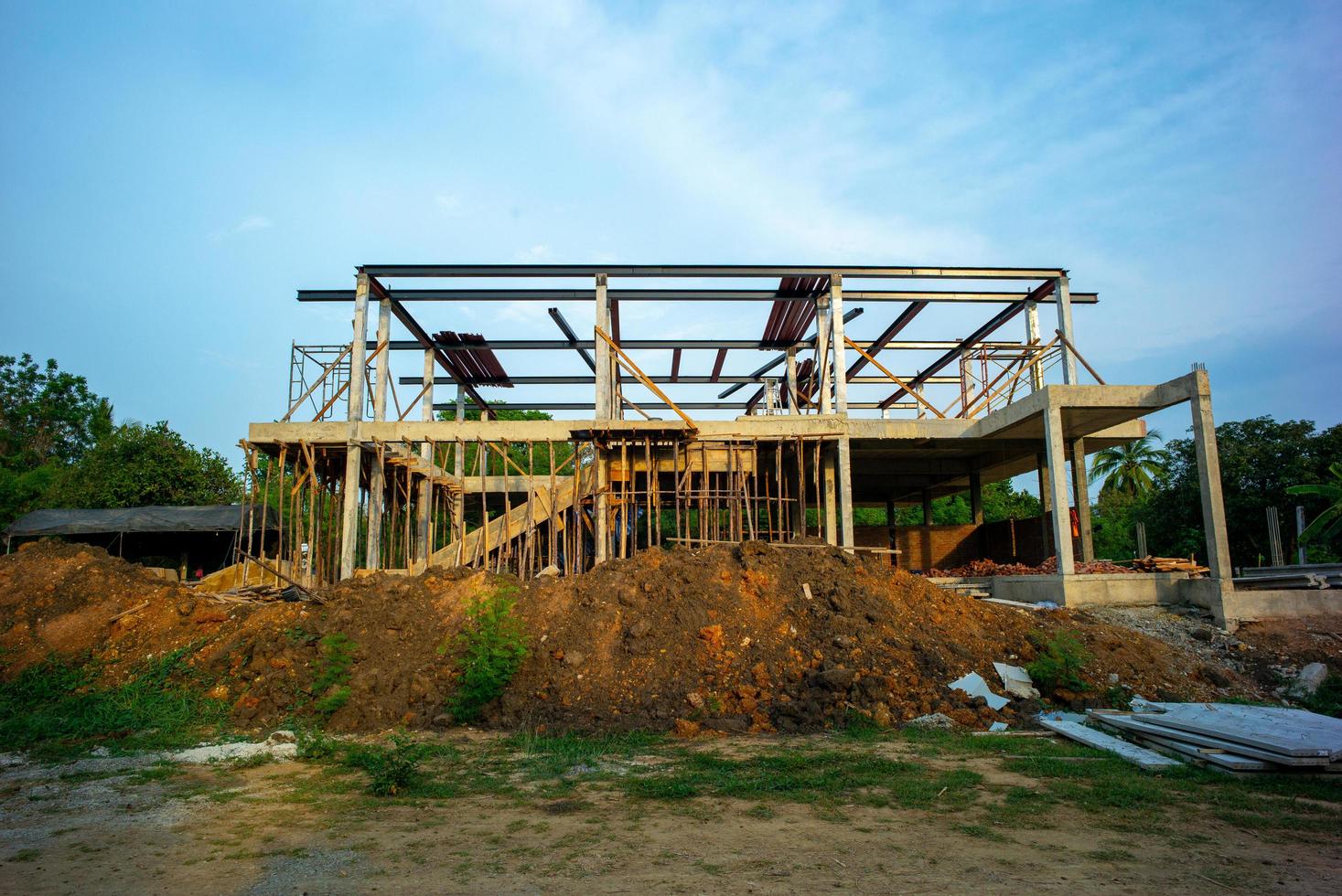 Landscape of house under construction with a blue sky background. photo