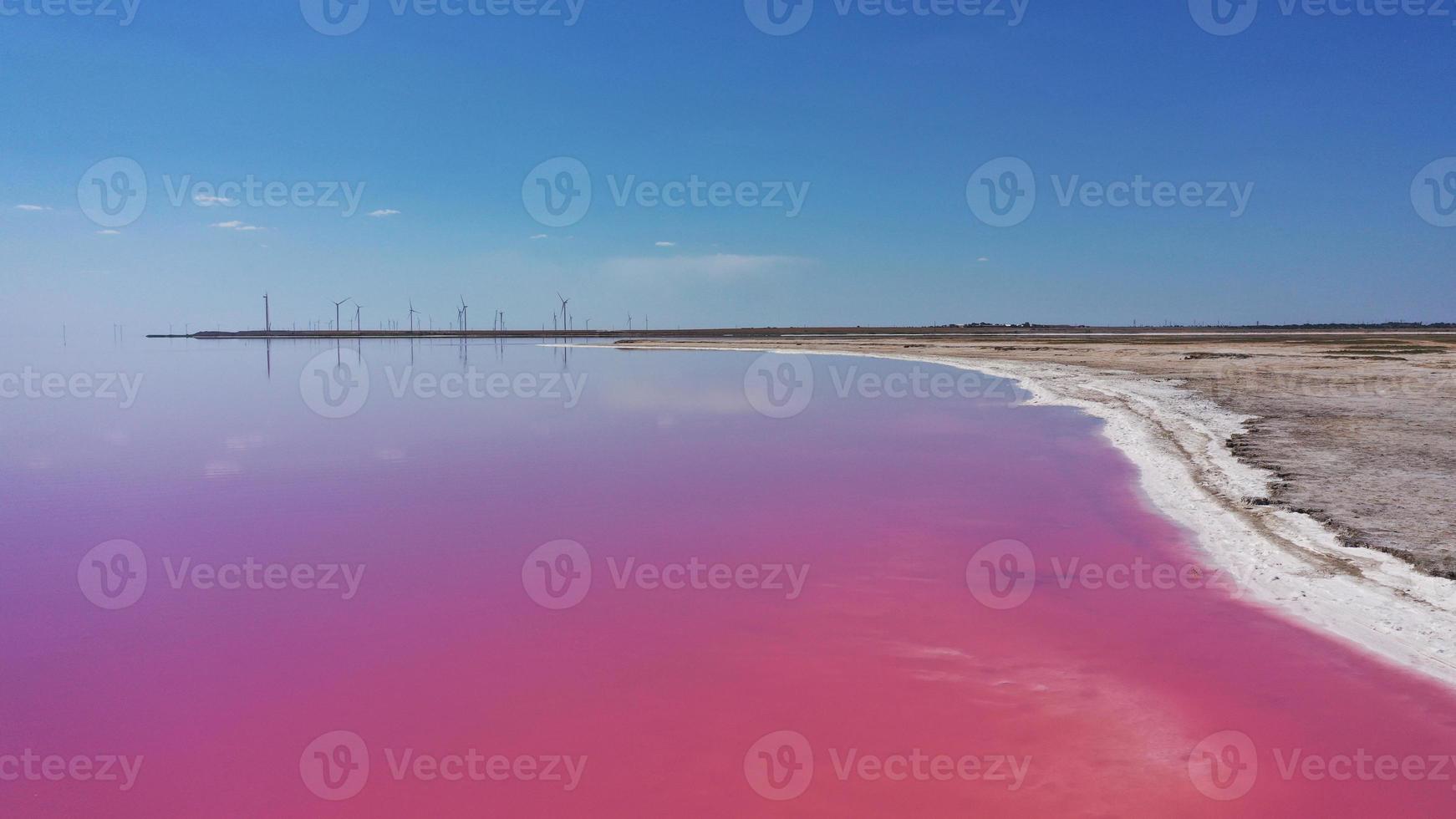 Aerial drone top down photo of a natural pink lake and blue sky in Odessa, Ukraine