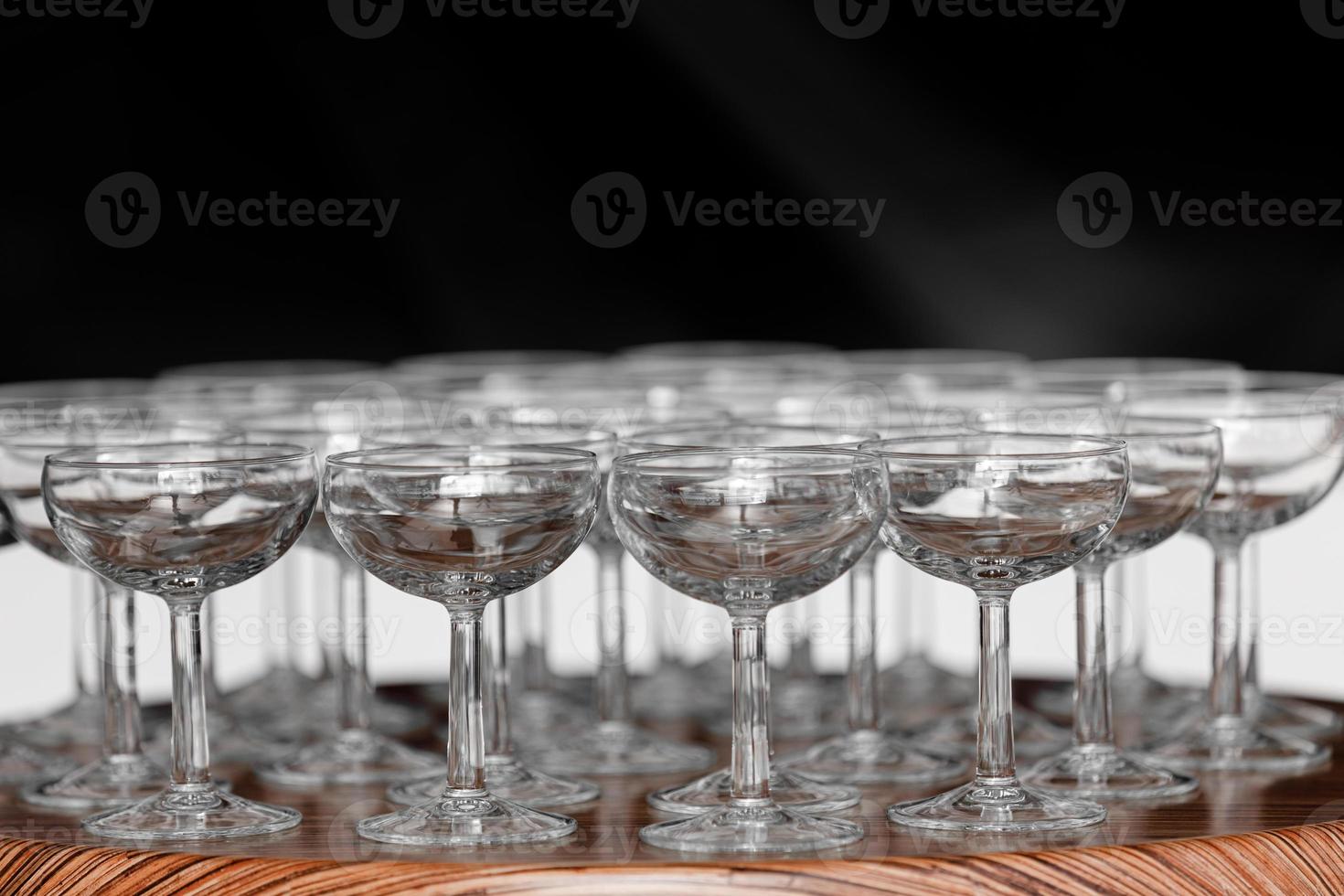 Many elegant empty glasses of wine or champagne photo